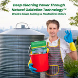 Person standing next to a large water tank with text about natural oxidation technology.