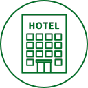 Green icon of a hotel building with 'HOTEL' text inside a circle