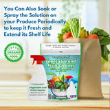 Solutions HCL Vegetable and Fruit Cleaner with a bag of fresh produce on a wooden surface.